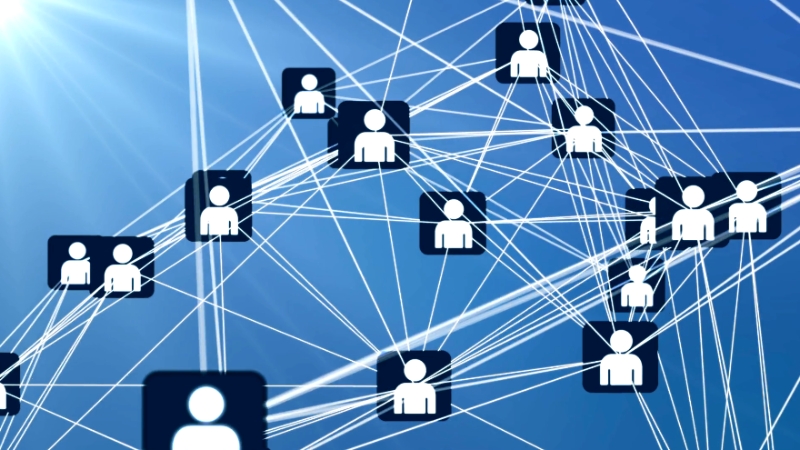 Illustration of connected user icons representing networked data management